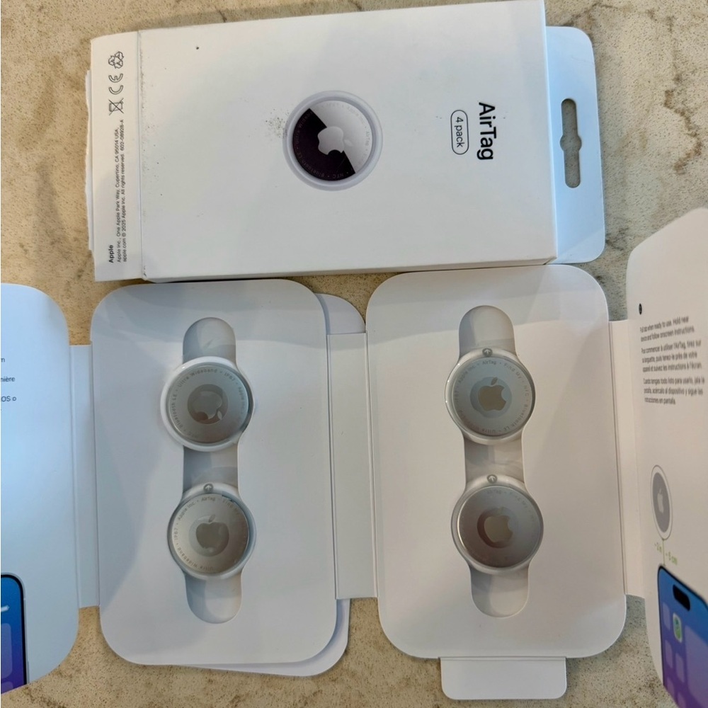 Apple AirTag 4-Pack in White and Silver